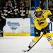 Michigan senior center Kevin Lynch takes a slap shot in the first period of the game against Western Michigan on Saturday. Daniel Brenner I AnnArbor.com